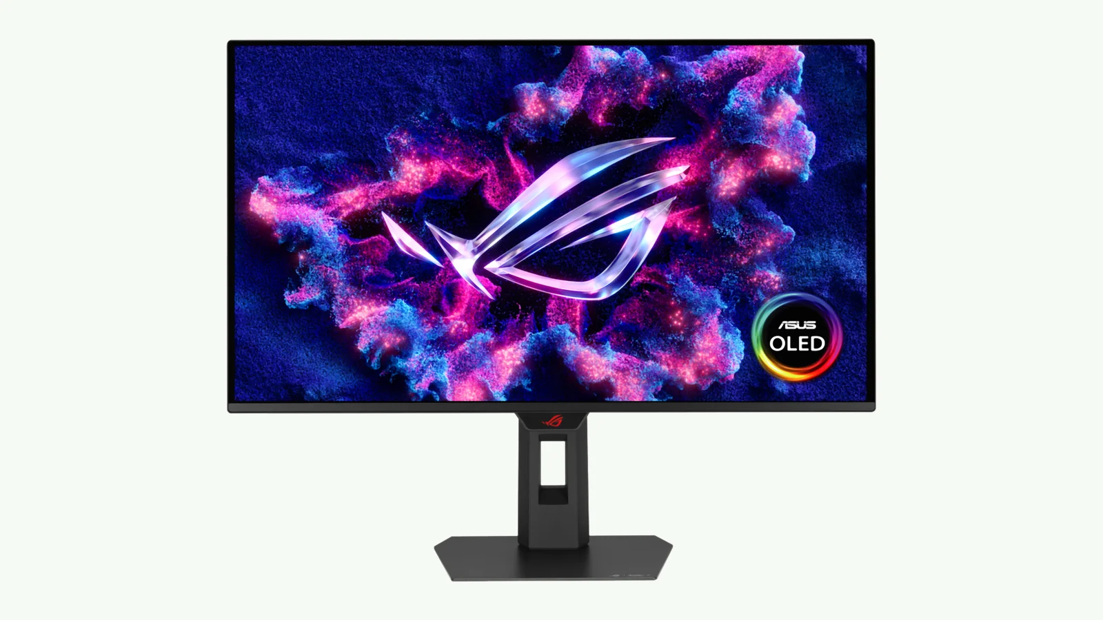 Front-facing ASUS ROG Strix OLED XG27ACDMSR on its stand, with a colorful ROG graphic on screen against a pale background